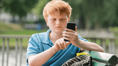 Boy using smart phone
