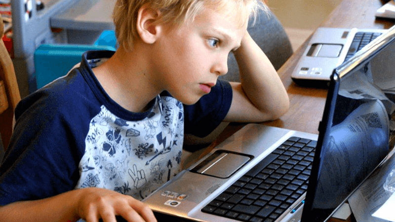 Child using laptop