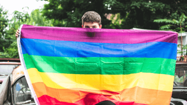 Man with LGBT flag