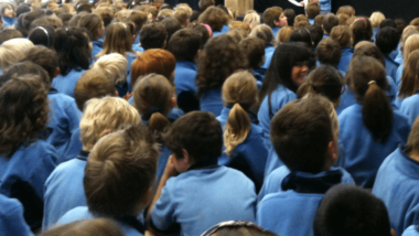Children in school assembly