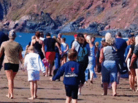 ‘I put the invitation online. God did the rest’: 170 baptised at Devon beach
