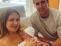 Baby thriving after in-womb surgery to fix organs growing outside his body