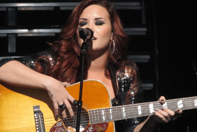 Demi Lovato’s anti-Christian album posters removed by ASA