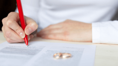 Woman signing form
