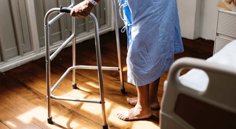 Elderly person with Zimmer frame