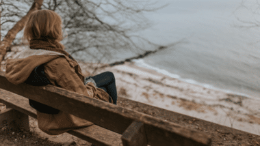 Woman staring at ocean